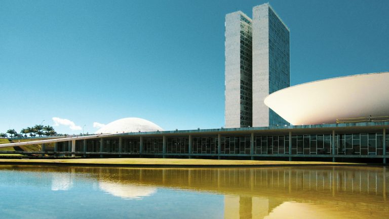 Brazil's National Congress building in Brasília reflected in water