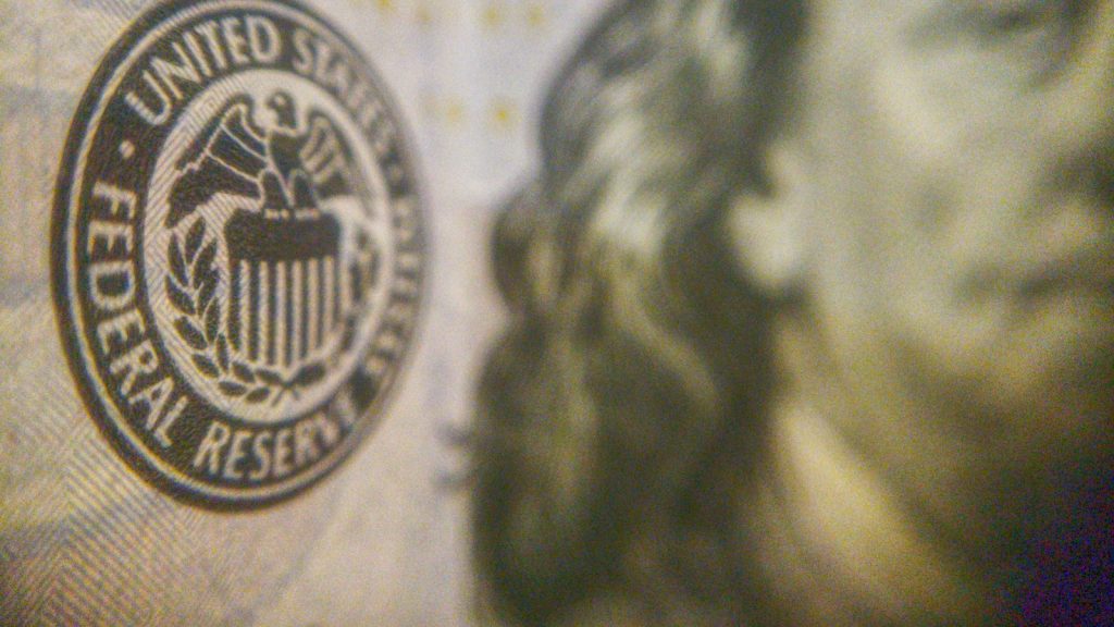 Federal Reserve seal printed on a US dollar banknote