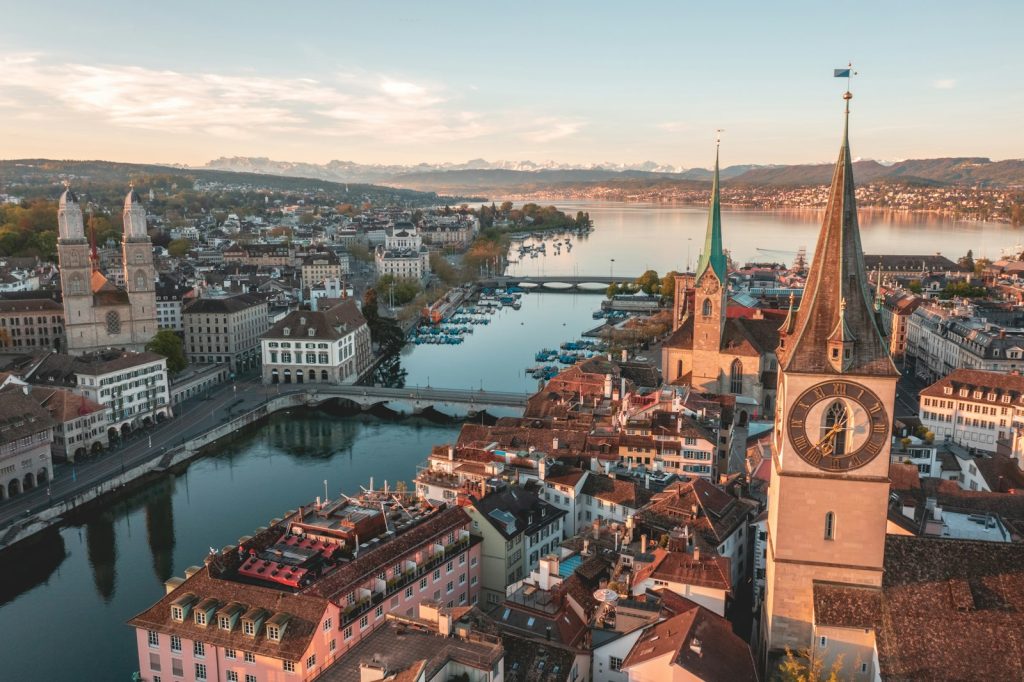 Aerial view of Zurich's old town, the St. Peter church clock tower and the Limmat river