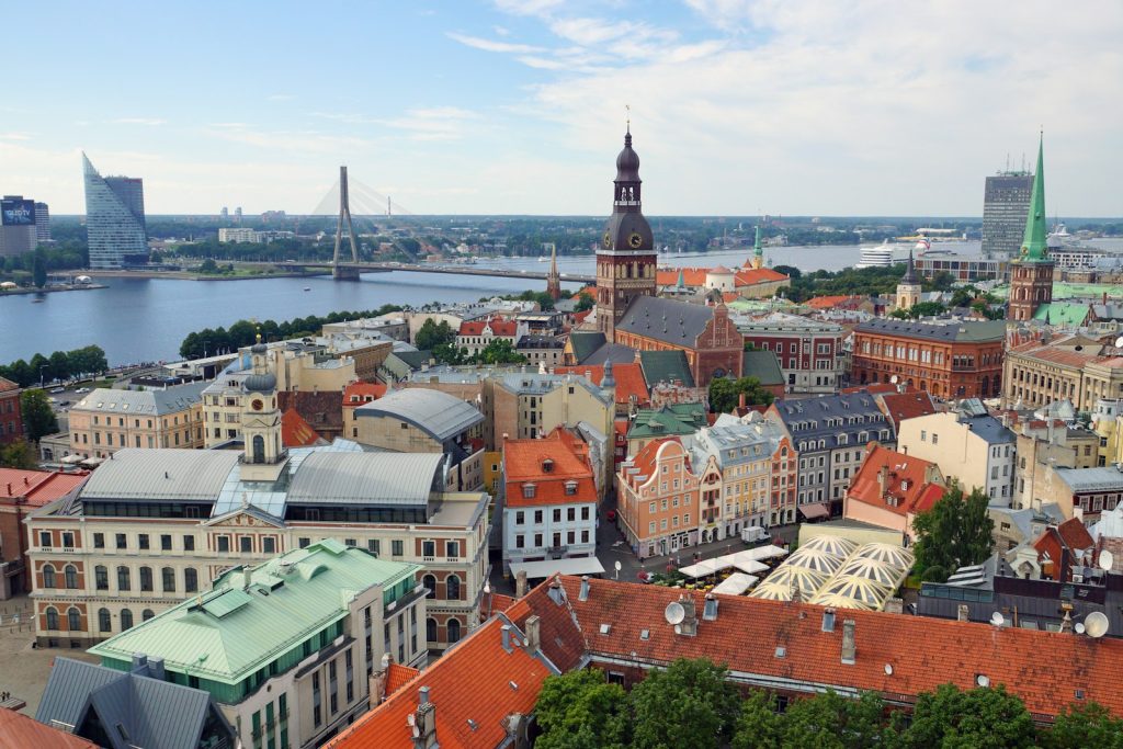 Rooftops of Riga's old town with the cathedral tower and the Daugava river