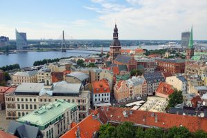 Rooftops of Riga's old town with the cathedral tower and the Daugava river