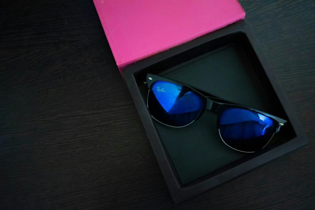 Pair of Ray-Ban glasses resting in an open case
