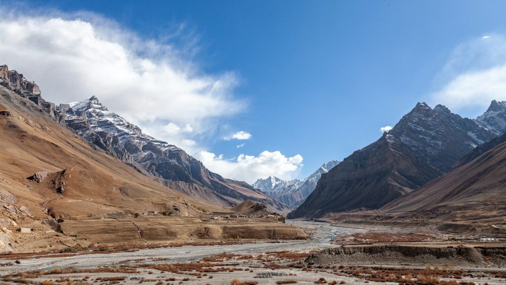 River running through a steep mountain valley in the Himalayas